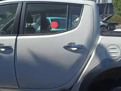 Автозапчастина б/у двері задні ліві для mitsubishi l 200 (ka0/kb0) 2.5 di-d cat посилання на oem iam 