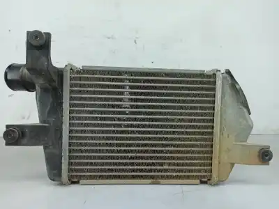Автозапчасти б/у интеркулер за mitsubishi l 200 (ka0/kb0) 2.5 di-d cat ссылки oem iam mn135001  