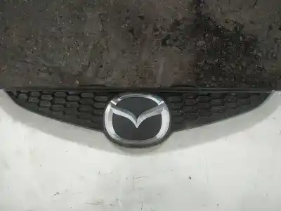 Автозапчасти б/у передняя решетка за mazda 2 lim. (de) 1.4 diesel cat ссылки oem iam    Автозапчасти б/у передняя решетка за mazda 2 lim. (de) 1.4 diesel cat ссылки oem iam