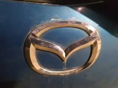 Автозапчастина б/у емблема для mazda 2 lim. (de) 1.3 active + посилання на oem iam   
