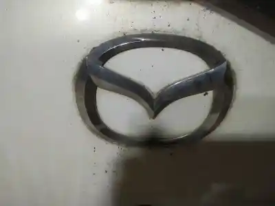 Автозапчасти б/у эмблема за mazda 2 lim. (de) 1.4 diesel cat ссылки oem iam  Автозапчасти б/у эмблема за mazda 2 lim. (de) 1.4 diesel cat ссылки oem iam