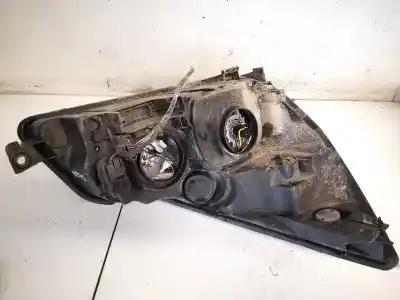 Автозапчасти б/у левая фара за renault espace iv (jk0) 2.0 dci diesel fap cat ссылки oem iam 8200394712  