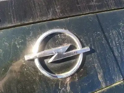 Peça sobressalente para automóvel em segunda mão emblema por opel zafira a 2.0 dti referências oem iam 