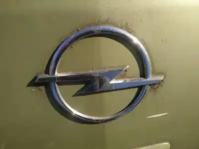 Second-hand car spare part front badge for opel corsa d 1.4 16v bivalent (gasolina / gas licuado del petróleo. gpl) oem iam references 