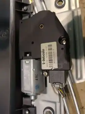 Pièce détachée automobile d'occasion MOTEUR DE TOIT ÉLECTRIQUE pour OPEL CORSA A FASTBACK (S83) 1.2 I (F08, M08, F68, M68) Références OEM IAM H032V2  