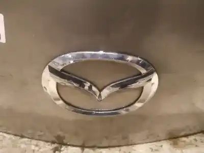 Peça sobressalente para automóvel em segunda mão emblema por mazda 3 (bk) 1.6 di turbo referências oem iam 