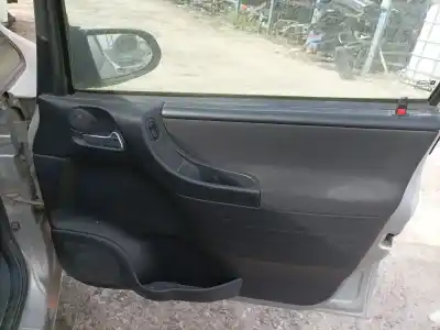 Recambio de automóvil de segunda mano de guarnecido puerta delantera derecha para opel zafira a monospace (t98) 2.0 dti 16v (f75) referencias oem iam 