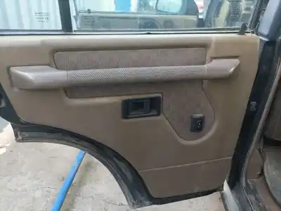 Pezzo di ricambio per auto di seconda mano Rivestimento Portiera Posteriore Sinistra per LAND ROVER DISCOVERY (SALLJG/LJ) 2.5 Turbodiesel Riferimenti OEM IAM   
