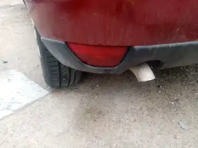 Автозапчастина б/у ліва задня протитуманна фахра для ford focus i (daw, dbw) 1.8 turbo di / tddi посилання на oem iam 