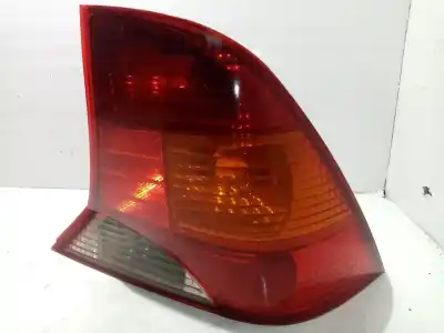 Автозапчасти б/у правый задний фонарь за ford focus i sedán (dfw) 1.8 turbo di / tddi ссылки oem iam xs4x13404  