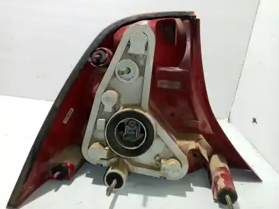 Автозапчасти б/у правый задний фонарь за ford focus i sedán (dfw) 1.8 turbo di / tddi ссылки oem iam xs4x13404  