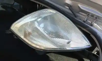 Peça sobressalente para automóvel em segunda mão Farol / Farolim Esquerdo por FORD FIESTA (CBK) Trend Referências OEM IAM 1320349  