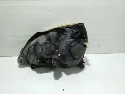 Pezzo di ricambio per auto di seconda mano faro anteriore destro per renault clio ii fase ii (b/cb0) 1.5 dci diesel 65 cv / 48 kw riferimenti oem iam 7701054063  