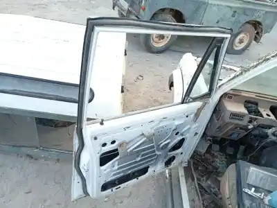 Автозапчасти б/у левая передняя дверь за mitsubishi montero (v20/v40) 2.5 td cat ссылки oem iam mb275442  