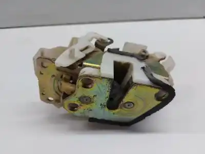 Автозапчастина б/у замок передній праві двері для mitsubishi l 200 k6 7 2500 td glx 4-ptas. посилання на oem iam   