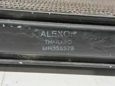 Автозапчастина б/у масляний радіатор для mitsubishi l 200 k6 7 2500 td glx 4-ptas. посилання на oem iam mr355379  