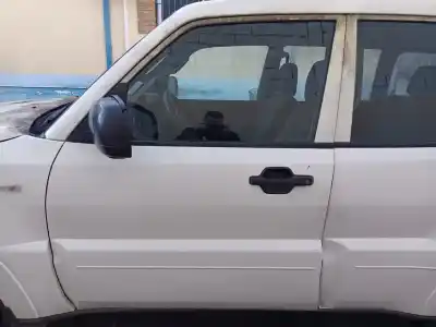 Автозапчасти б/у левая передняя дверь за mitsubishi montero (v80/v90) 3.2 di-d intense ссылки oem iam 