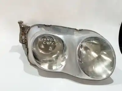 Pezzo di ricambio per auto di seconda mano FARO ANTERIORE DESTRO per HYUNDAI COUPE (RD) 1.6 FX [1.6 Ltr. - 79 kW 16V CAT] Riferimenti OEM IAM 1013698  
