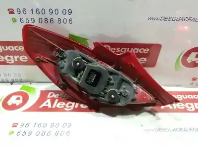 Автозапчастина б/у правий ліхтар для opel corsa d essentia посилання на oem iam 13186351  89038961