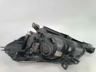 Second-hand car spare part right headlight for renault clio iii pack authentique oem iam references 7701061069  7701061069