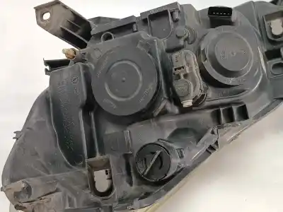 Second-hand car spare part right headlight for renault clio iii pack authentique oem iam references 7701061069  7701061069