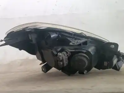 Second-hand car spare part left headlight for renault clio iii pack authentique oem iam references 8200459824  8200459824