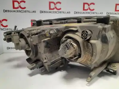 Second-hand car spare part left headlight for bmw serie 3 coupe (e46) 323 ci oem iam references 0301157205