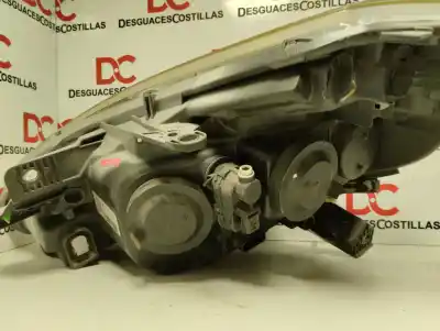 Second-hand car spare part right headlight for renault clio iii exception oem iam references 8200892498  