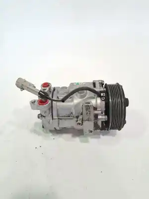 Pièce détachée automobile d'occasion Compresseur De Climatisation pour SUZUKI SWIFT III (MZ, EZ) Gasolina 2007 5P Références OEM IAM 9520084EA0  