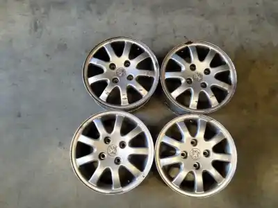 Recambio de automóvil de segunda mano de juego llantas para peugeot 206 cc 2.0 16v cat referencias oem iam   