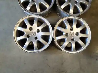 Recambio de automóvil de segunda mano de juego llantas para peugeot 206 cc 2.0 16v cat referencias oem iam   