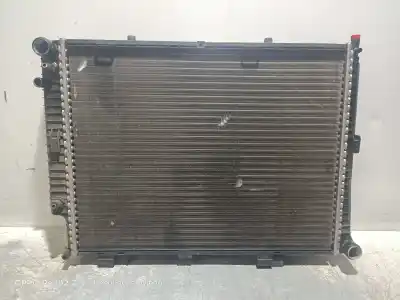 Pièce détachée automobile d'occasion Radiateur D'eau pour MERCEDES-BENZ CLASE E (W210) BERLINA 230 (210.037) Références OEM IAM 2105003003  