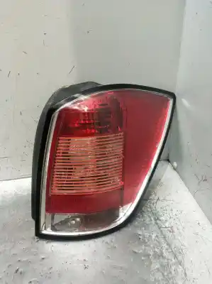 Pièce détachée automobile d'occasion feu arrière droit pour opel astra h caravan enjoy références oem iam 