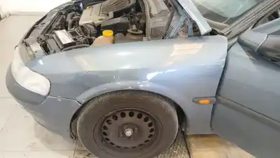 Автозапчасти б/у ЛЕВОЕ ПЕРЕДНЕЕ КРЫЛО за OPEL VECTRA B (J96) 1.6 I 16V (F19) ссылки OEM IAM 90503000  