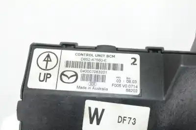 Автозапчастина б/у електронний модуль для mazda 2 (dy) 1.4 cd посилання на oem iam d65267560e  