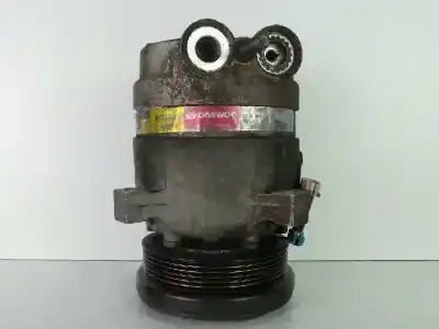 Second-hand car spare part AIR CONDITIONING COMPRESSOR for DAEWOO NUBIRA SEDÁN (J100)  OEM IAM references 700666  HARRISON - 6.CANALES