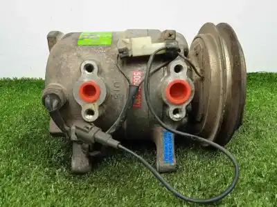 Pezzo di ricambio per auto di seconda mano compressore aria condizionata per nissan terrano (wd21) 2.7 td riferimenti oem iam 926000f000 dkv14c calsonic - 1.canal