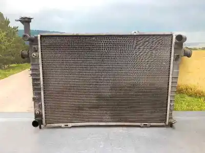 Pièce détachée automobile d'occasion RADIATEUR D'EAU pour HYUNDAI TUCSON (JM)  Références OEM IAM 253102E800  