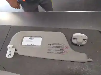 Second-hand car spare part right sunshade for renault clio iii authentique oem iam references 