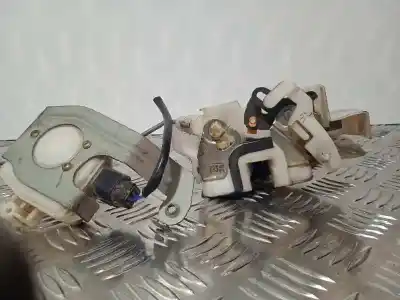 Автозапчастина б/у замок дверей заднього лівого для mitsubishi l 200 (k6/7) 2.5 td cat посилання на oem iam   