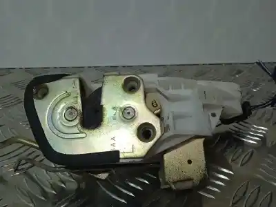 Автозапчастина б/у замок передніх дверей лівий для mitsubishi l 200 (k6/7) 2.5 td cat посилання на oem iam   