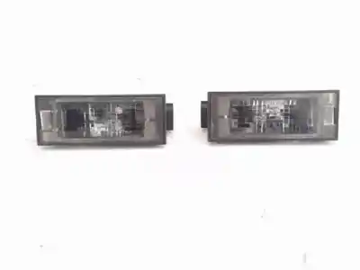 Recambio de automóvil de segunda mano de piloto matricula para renault clio iii 1.2 16v referencias oem iam 7700796163  