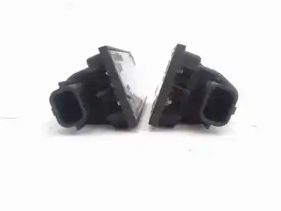 Recambio de automóvil de segunda mano de piloto matricula para renault clio iii 1.2 16v referencias oem iam 7700796163  