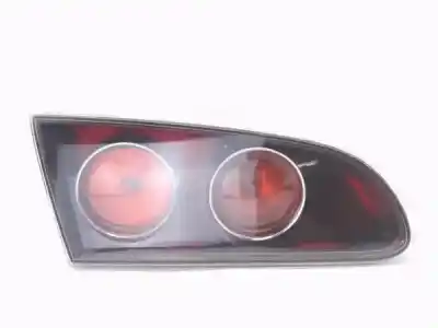 Pièce détachée automobile d'occasion FEU ARRIÈRE GAUCHE DANS LA PORTE pour SEAT IBIZA III (6L1) 1.4 16V Références OEM IAM 6L6945093L  