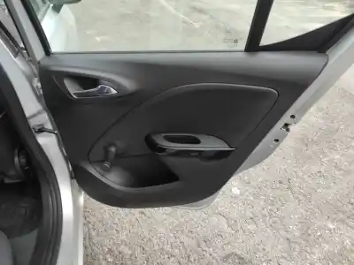 Автозапчасти б/у ОБИВКА ЗАДНЕЙ ПРАВОЙ ДВЕРИ за OPEL CORSA E (X15)  ссылки OEM IAM   