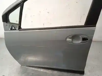 Pièce détachée automobile d'occasion porte avant gauche pour toyota yaris hybrid active références oem iam 670010d510  