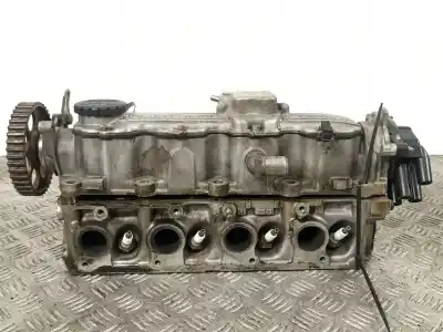 Pièce détachée automobile d'occasion culasse du moteur pour opel calibra 2.0 g références oem iam 90209896  