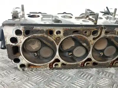 Pièce détachée automobile d'occasion culasse du moteur pour opel calibra 2.0 g références oem iam 90209896  