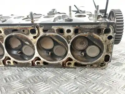 Pièce détachée automobile d'occasion culasse du moteur pour opel calibra 2.0 g références oem iam 90209896  