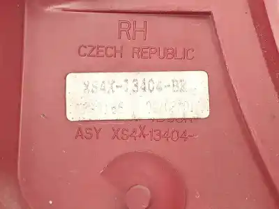 Автозапчасти б/у правый задний фонарь за ford focus i sedán (dfw) 1.8 turbo di / tddi ссылки oem iam xs4x13404be  